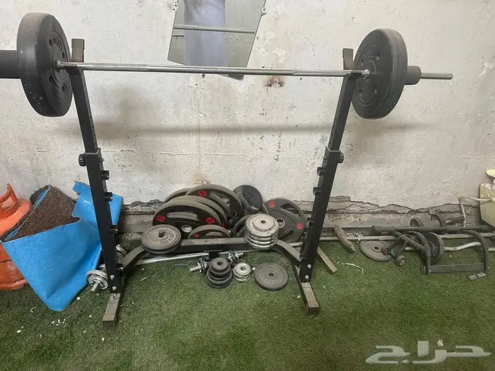 للبع اجهزة حديد مع اوزان وبارات وكراسي 1