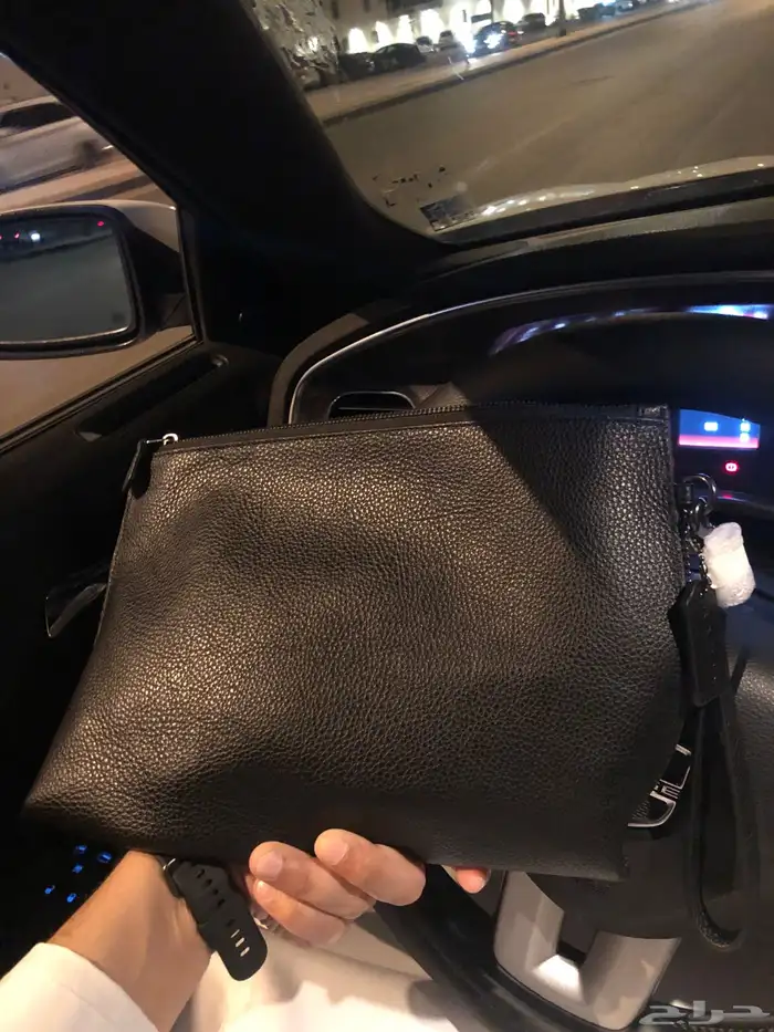 شنطة كوتش رجالية اصلية 2