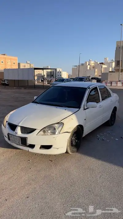 مستبيشي لانسر بومه 2004 index