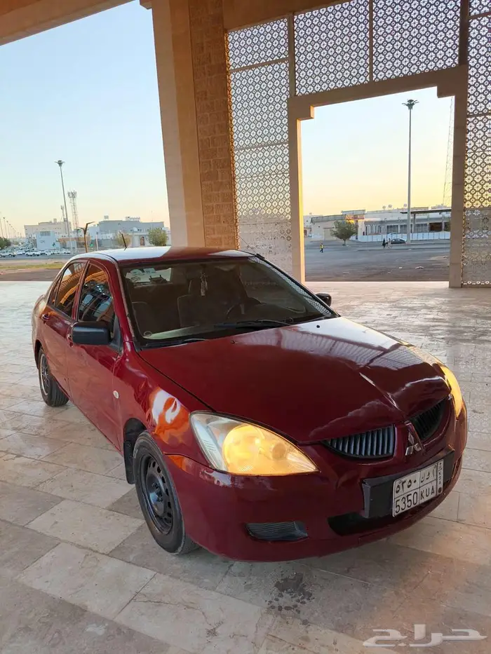 ميتسوبيشي لانسر سوم 9500 مديل 2006 1