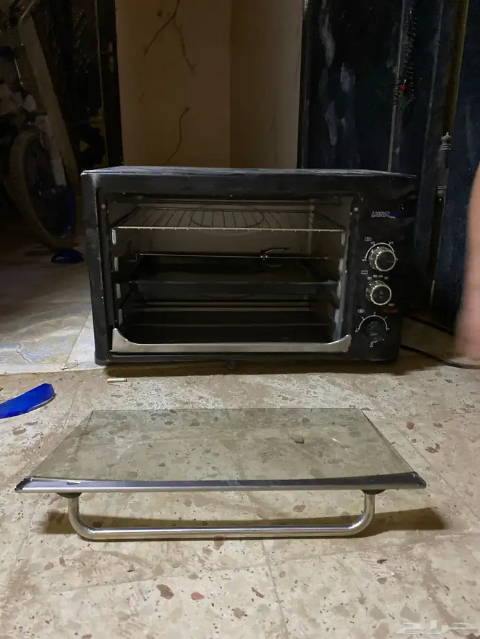 فرن كهربائي بس انه يحتاج تركب الباب حقه 1