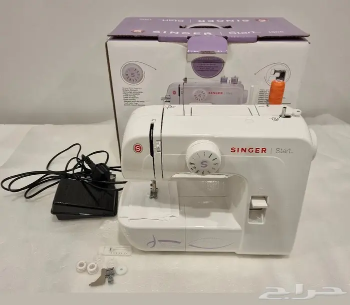 مكينة خياطة 0