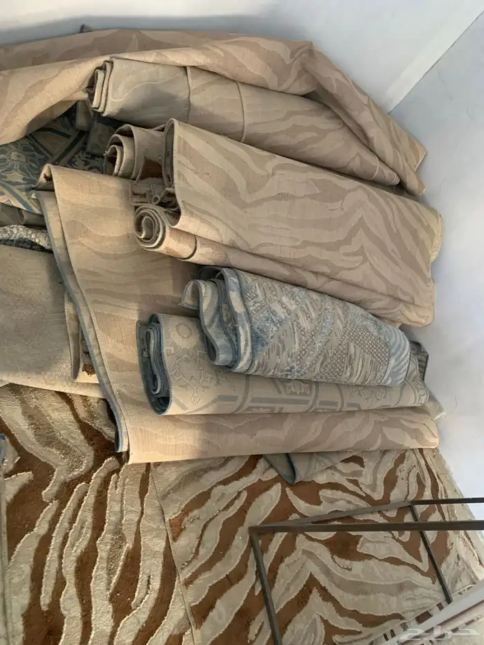 ثلاث غسالات ومفروشات سجاد 3