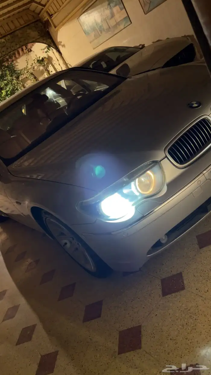 على السوم Bmw 2004 مخزن ولوحه مميزه 1