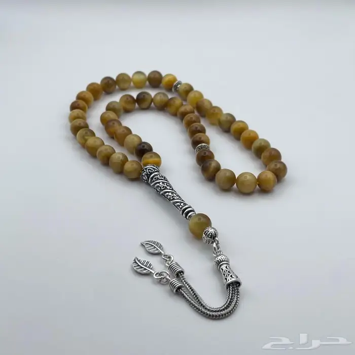 سبحة تايجر ذهبي مطعمة بالفضة 0
