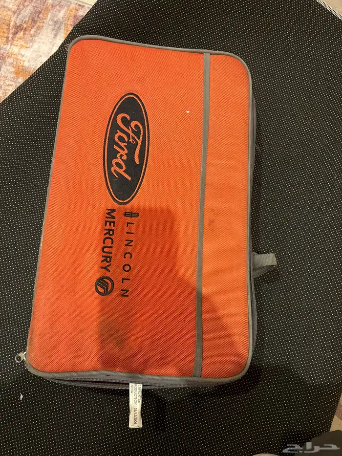 شنطة فورد اصليه مع الأغراض الموضح بصوره وكاله 1