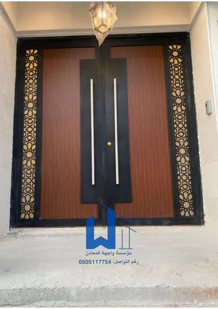 أبواب كلادينج أبواب حديد أبواب سحاب درابزين 0