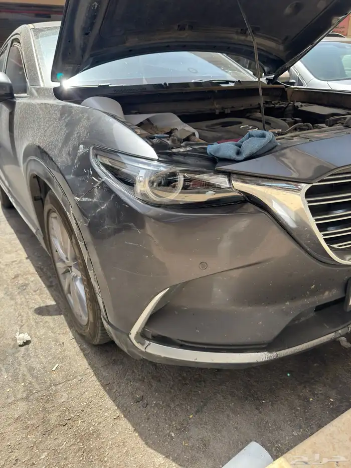 تغير الغطاء الخارج لشمعة الامامي مازداCX9 2