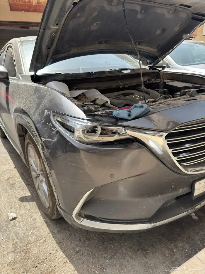 تغير الغطاء الخارج لشمعة الامامي مازداCX9 3