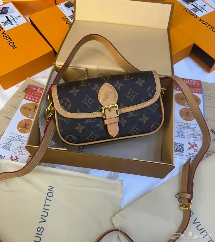 شنط اقنر وسان لوران وشانيل 33