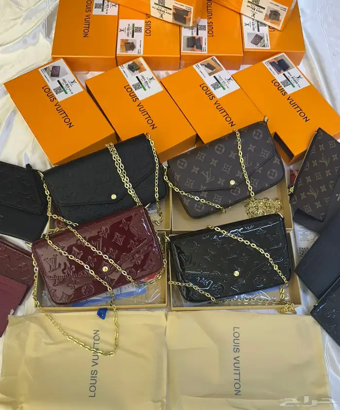 شنط اقنر وسان لوران وشانيل 27