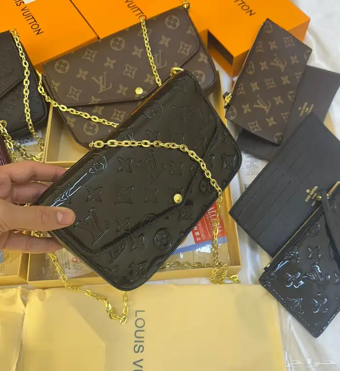 شنط اقنر وسان لوران وشانيل 28