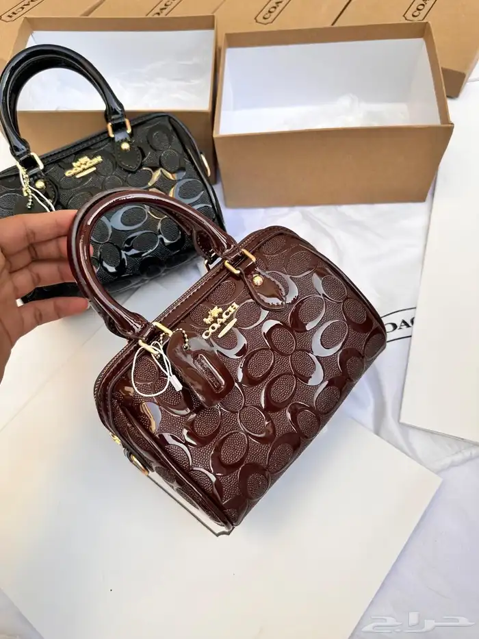 شنط اقنر وسان لوران وشانيل 79