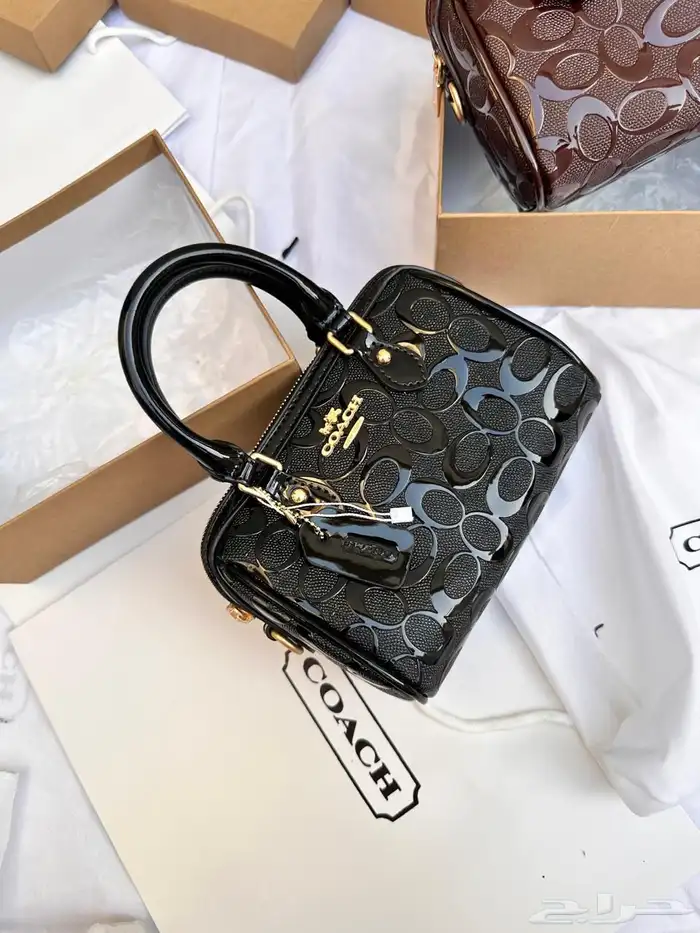 شنط اقنر وسان لوران وشانيل 77