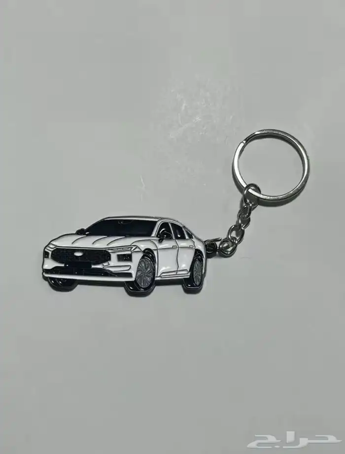 ميداليه حديد على شكل سياره 0