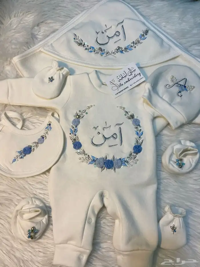 تطريز على اطقم مواليد 5