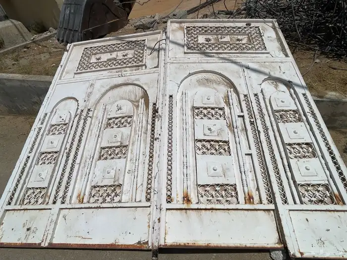 باب كراج حديد ثقيل درفتين ارتفاع 2.75 م وعرض2.90 م 1