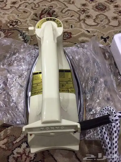 كاويه ملابس و شاحن متنقل 0