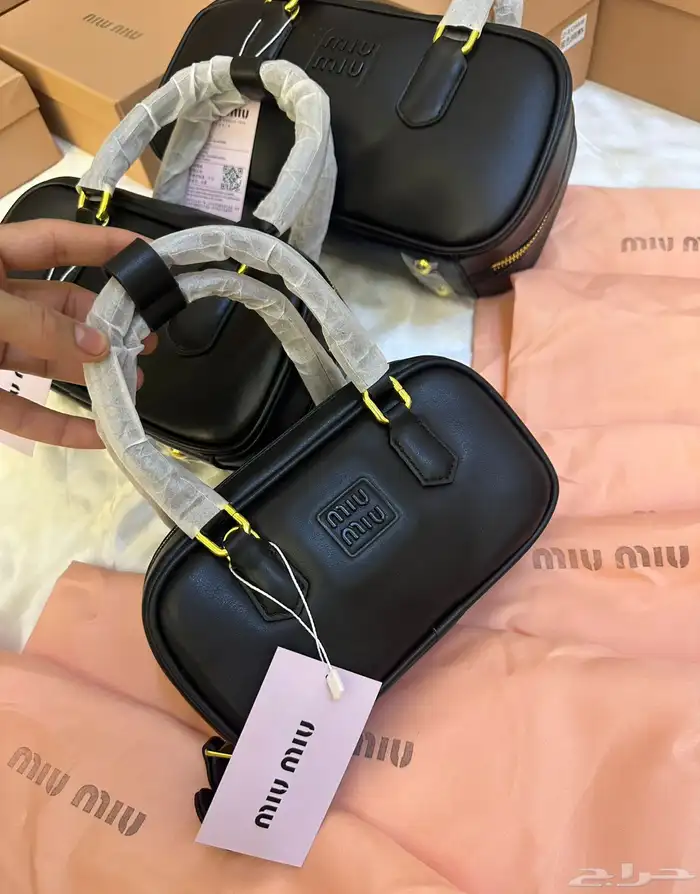 شنط برادا ميوميو كوتش سان لوران شانيل مع الملحقات 16