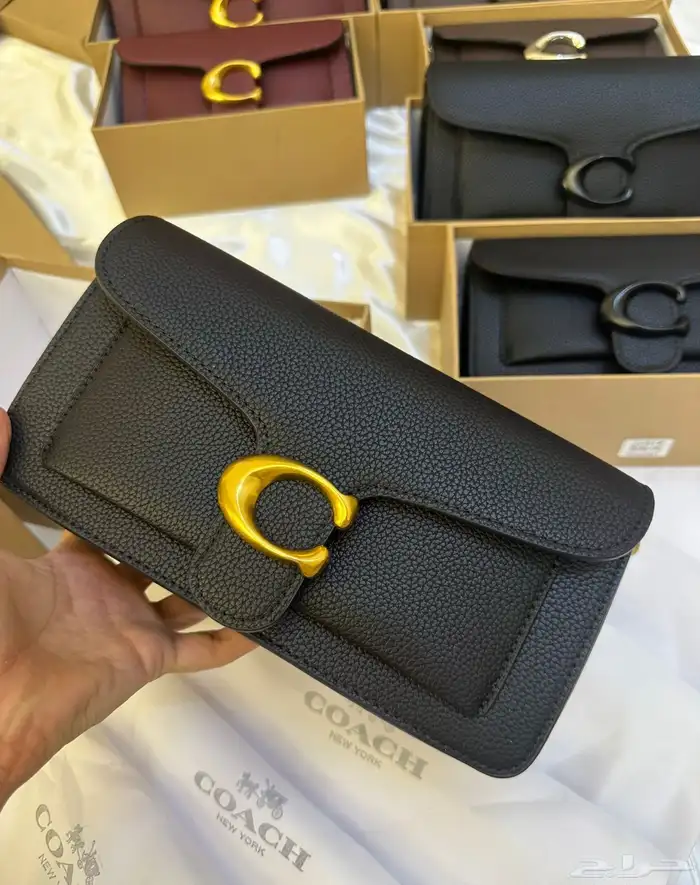 شنط برادا ميوميو كوتش سان لوران شانيل مع الملحقات 29