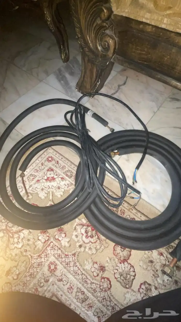 لفتين مواسير مكيف مع سلك كهرباء 0