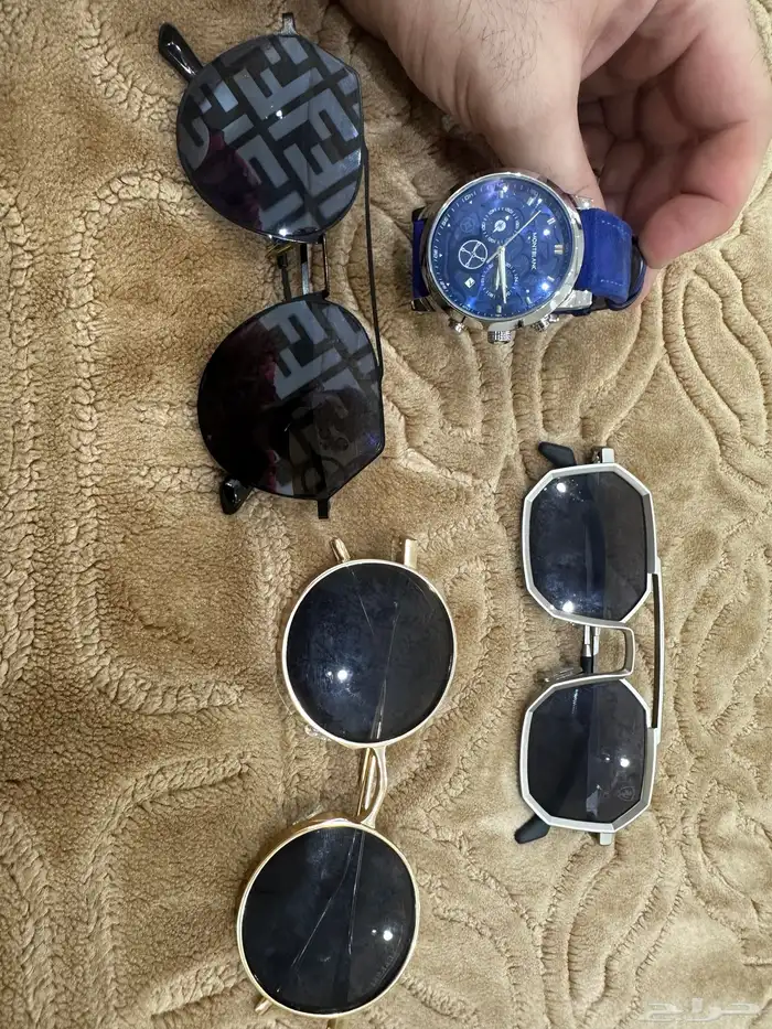 ساعة ونظارات 9