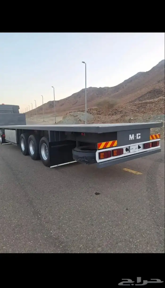 تريله سطحا واجوانب متواجد بتبوك لتحميل لي اتجاه 0