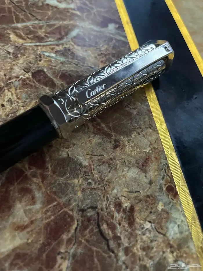 قلم كارتير وساعه 0