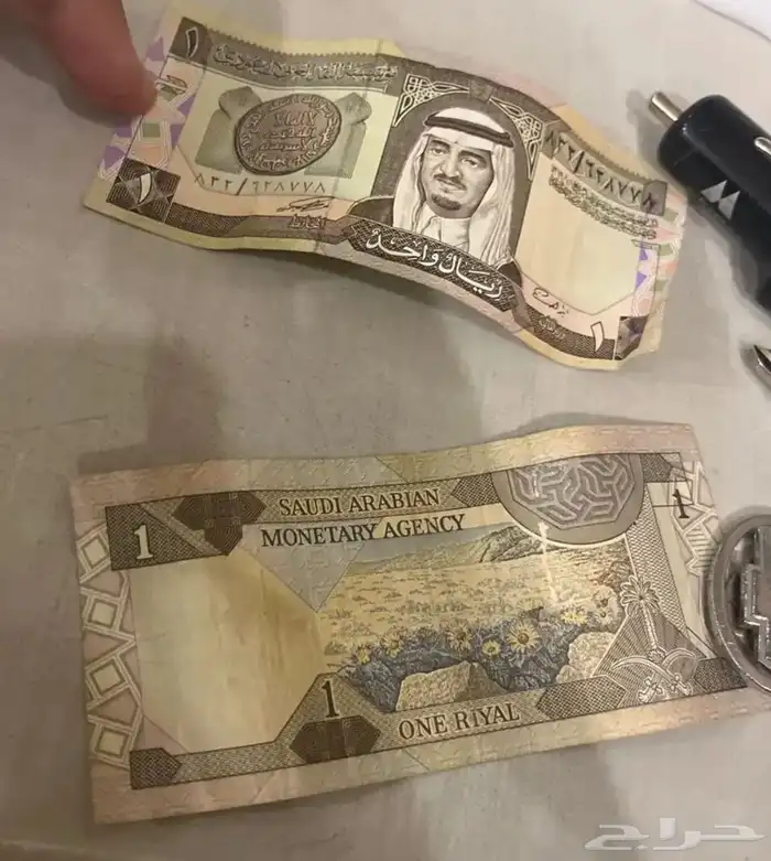 عملات قديمه نصين الملك خالد وخمسين الملك عبدالله وريال فهد 2