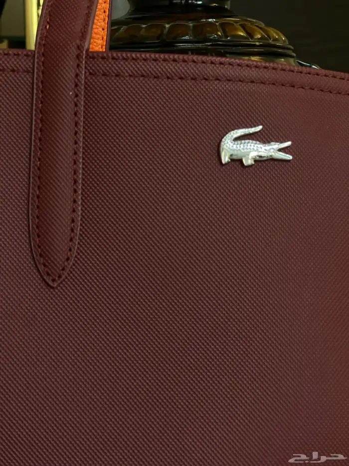 شنطة لاكوست جديده ونظيفه 0