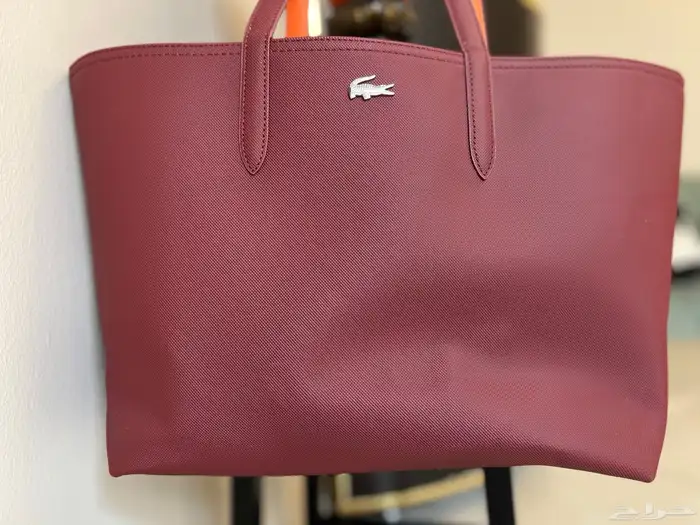 شنطة لاكوست جديده ونظيفه 1