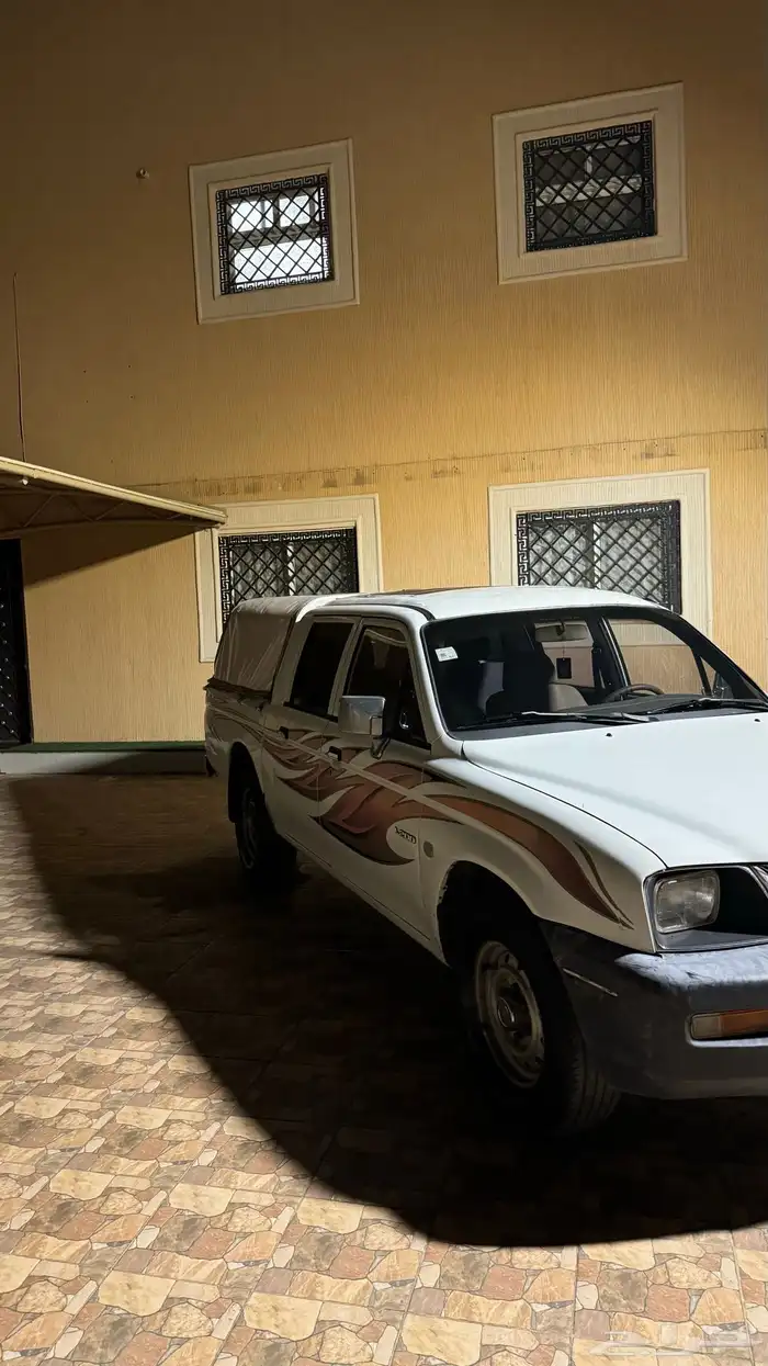 ميتسوبيشي 2002 7