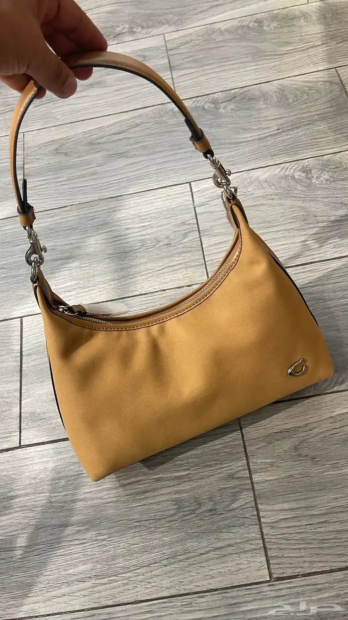 شنط ماركات مختلفه 16