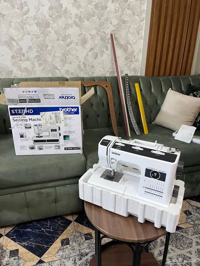 ماكينة خياطة ماركة brother st371hd شبه جديدة 1