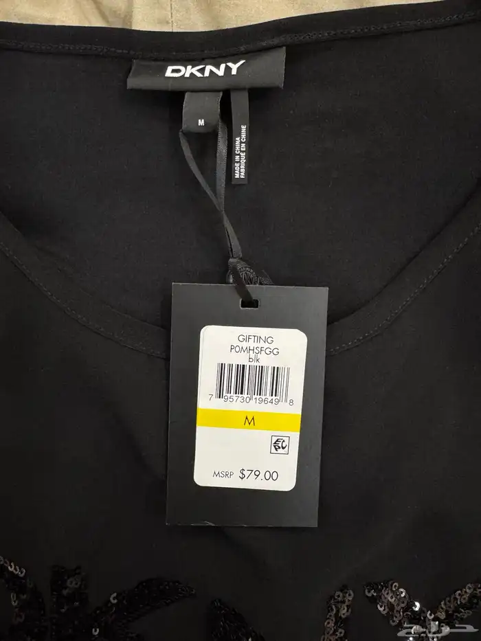 بلوزة ماركة دكني DKNY اصليه جديدة لم تستخدم 3