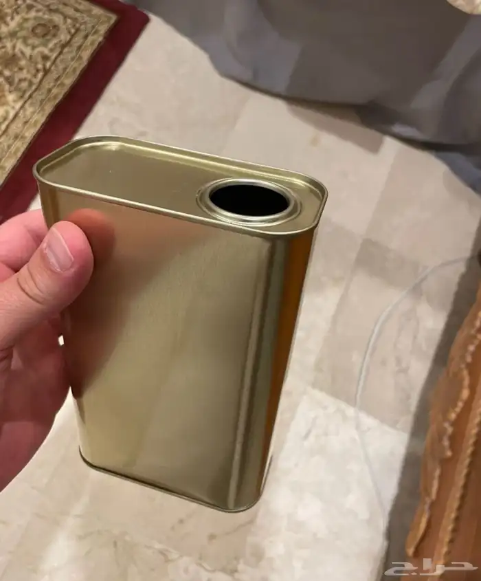علب تنك تمر وجوالين زيت زيتون 0