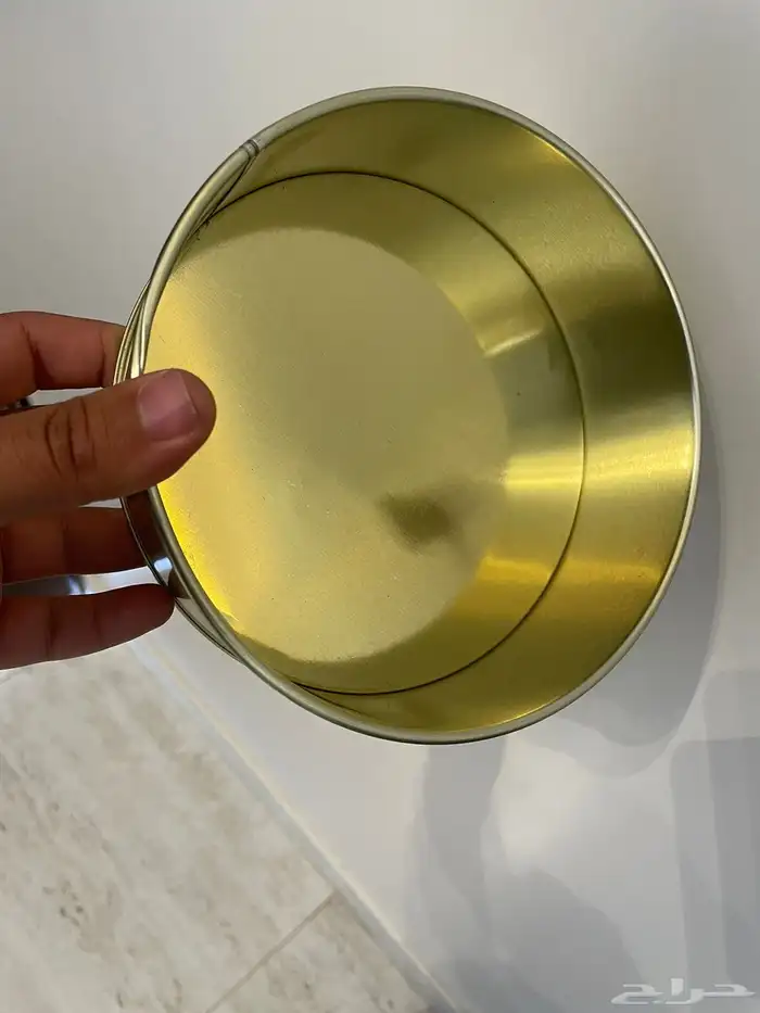 علب تنك تمر وجوالين زيت زيتون 3