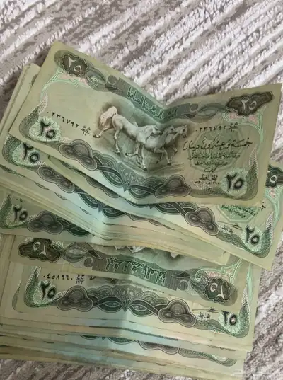 عملات عراقيه قديمه لصدام لاغتناء 0