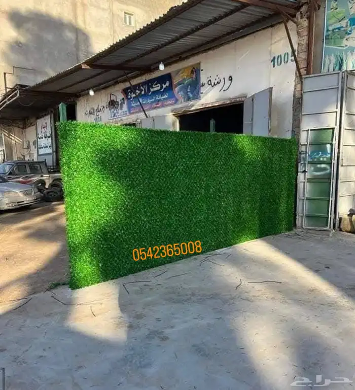 حاجز وساتر عشبي للحدائق والاستراحات 26