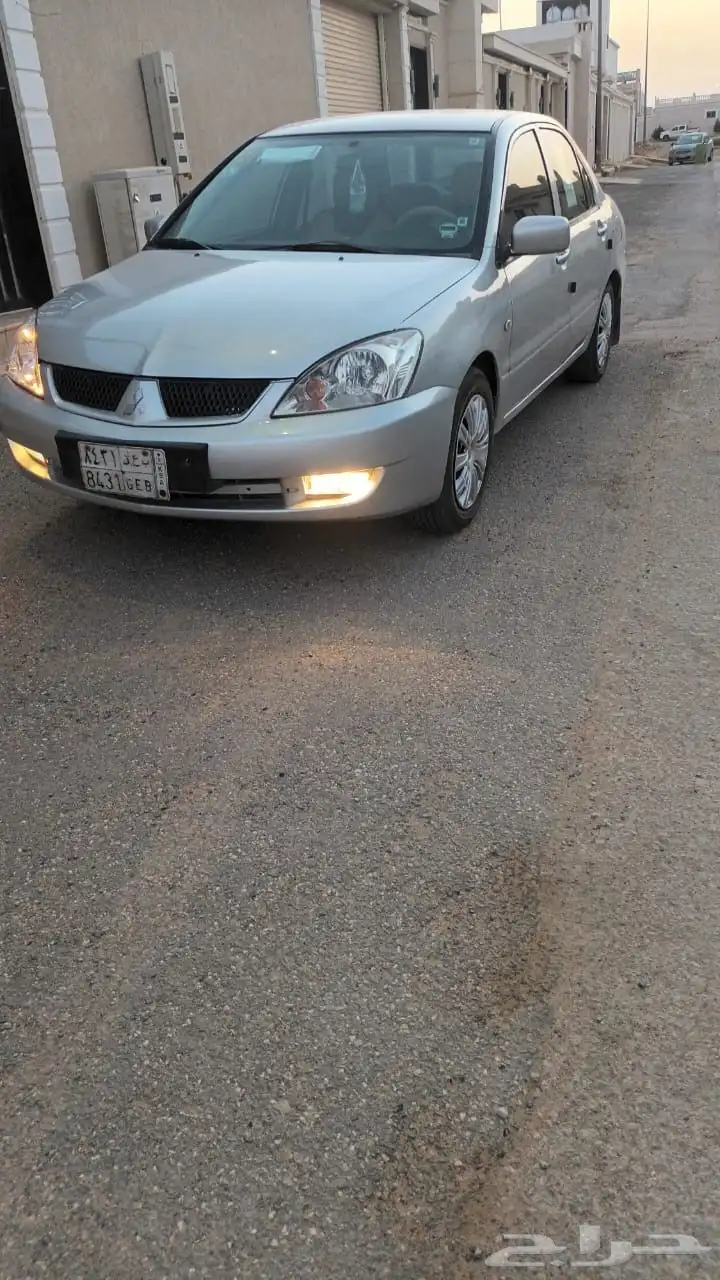 لانسر 2011 تماتيك 0
