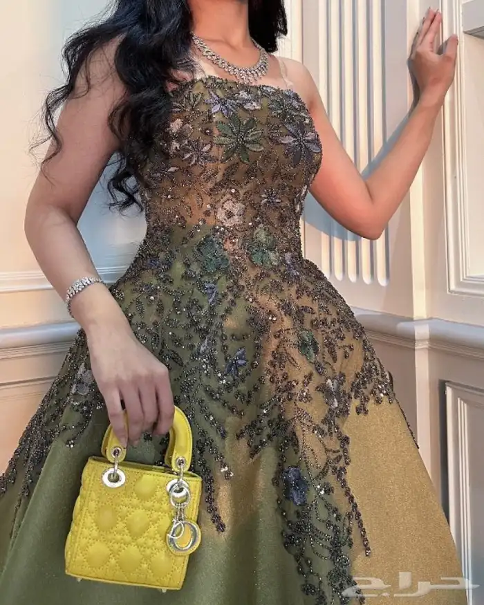 فستان سهرة زيتي فاخر بتصميم واسع(مقاس XS) 2