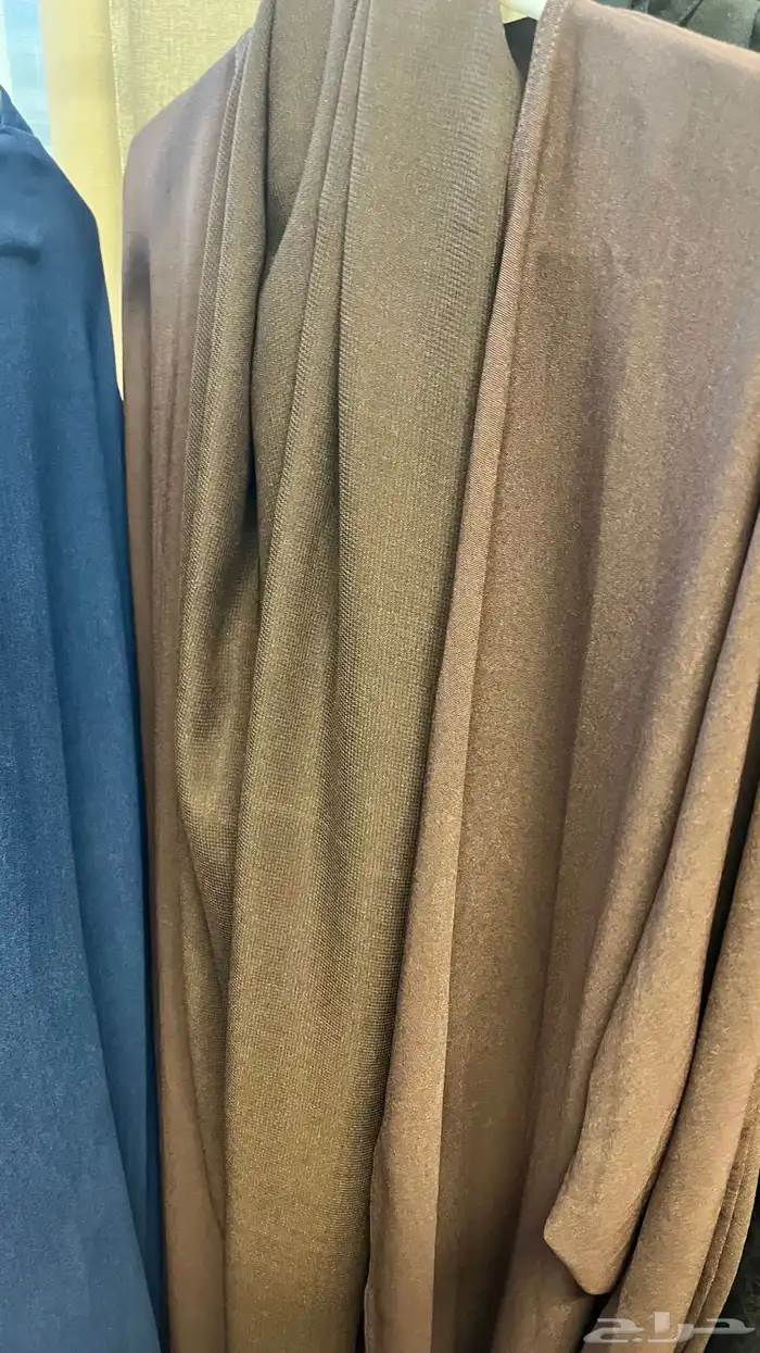 عبايات جديده غير ملبوسه الالوان بني وأزرق مقاس 54 4