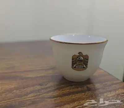 طقم فناجيل قهوة عربية من ليموج (Bernardaud) بشعار الإمارات 4