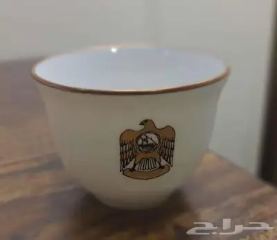 طقم فناجيل قهوة عربية من ليموج (Bernardaud) بشعار الإمارات 0