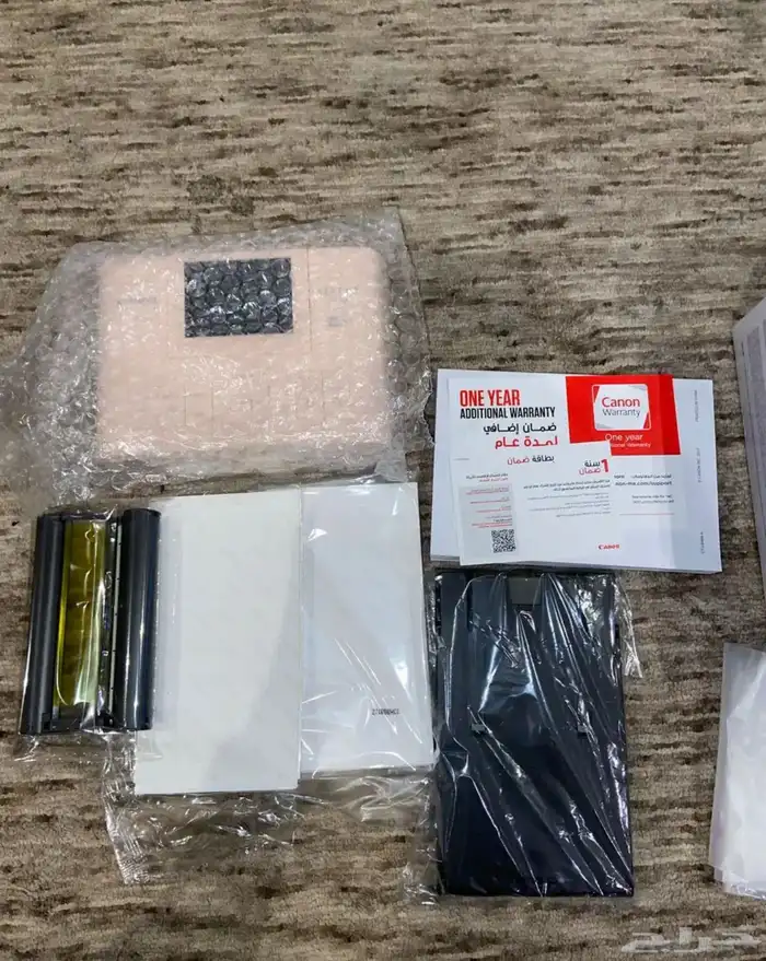 طابعة الصور المحمولة Canon selphe CP1300 4