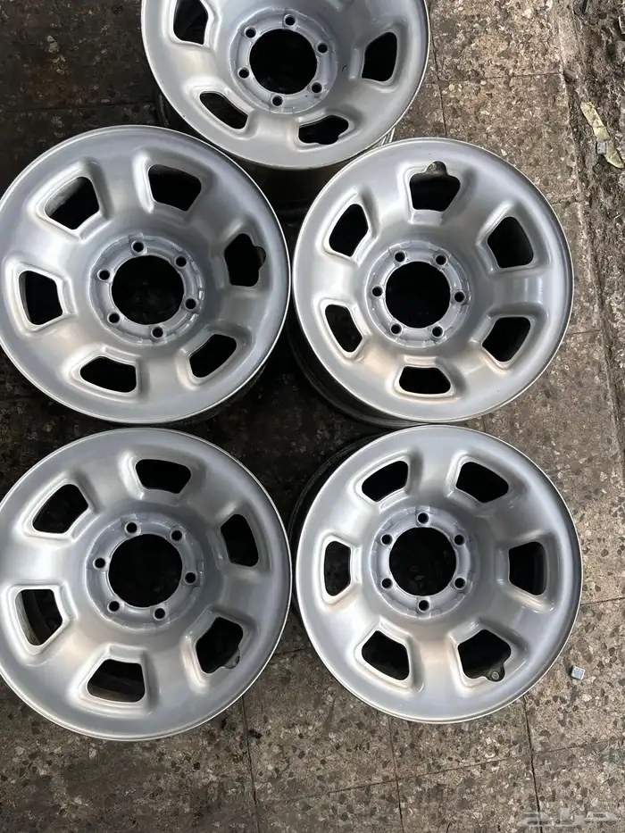 5 جنوط نيسان اصلي وكاله  مقاس 16 11