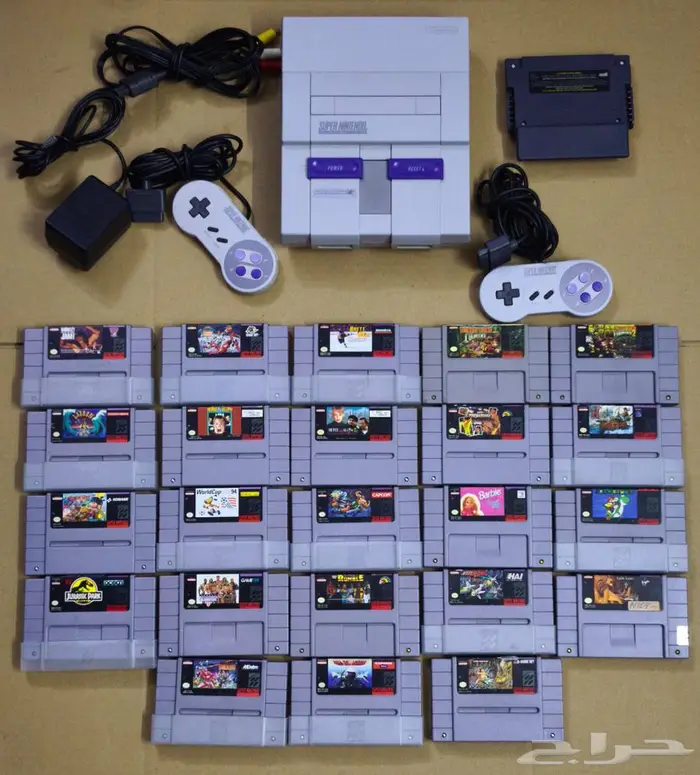 تم البيع- جهاز سوبر نينتندو مع يدين و 23 شريط اصلي snes 0