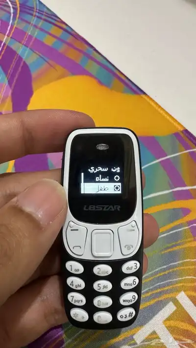 اصغر جوال بالعالم اصغر من الولاعه مع إمكانية تغيير صوتك 6