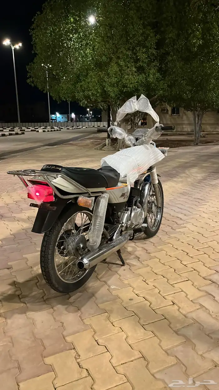 سوزوكي AX100 0