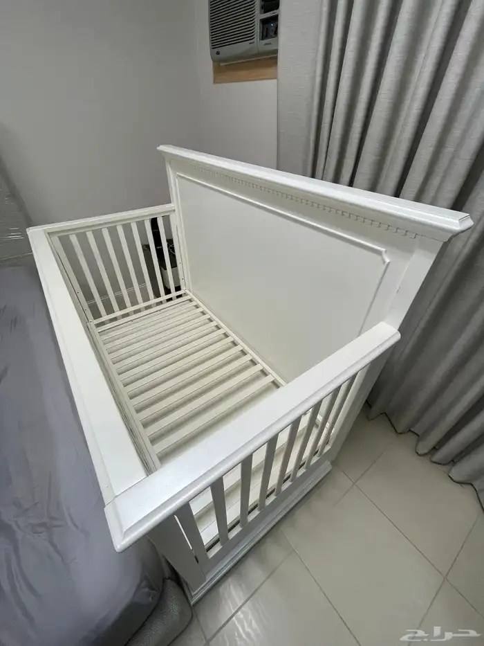 سرير أطفال بأدراج مستخدم 6